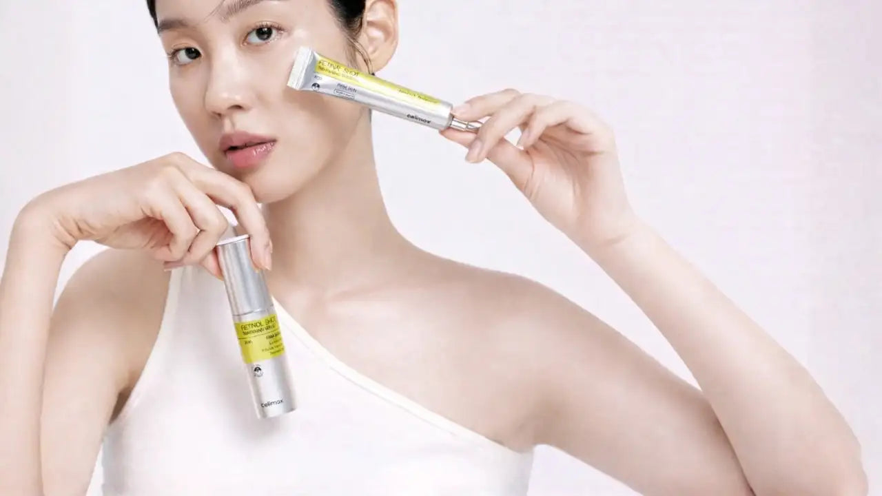 Tube argenté et jaune de produit de soin de la peau