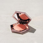 fenty-beauty-diamond-bomb-all-over-diamond-veil-highlighter